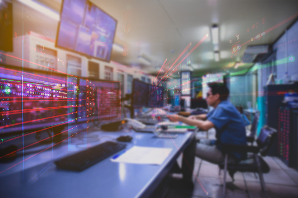 AdvanZit engineer utilizing advanced IT monitoring tools for remote tech management